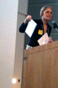 Gloria Steinem holding ERA card